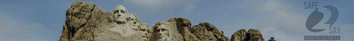 Mount Rushmore with the Safe2Say South Dakota logo